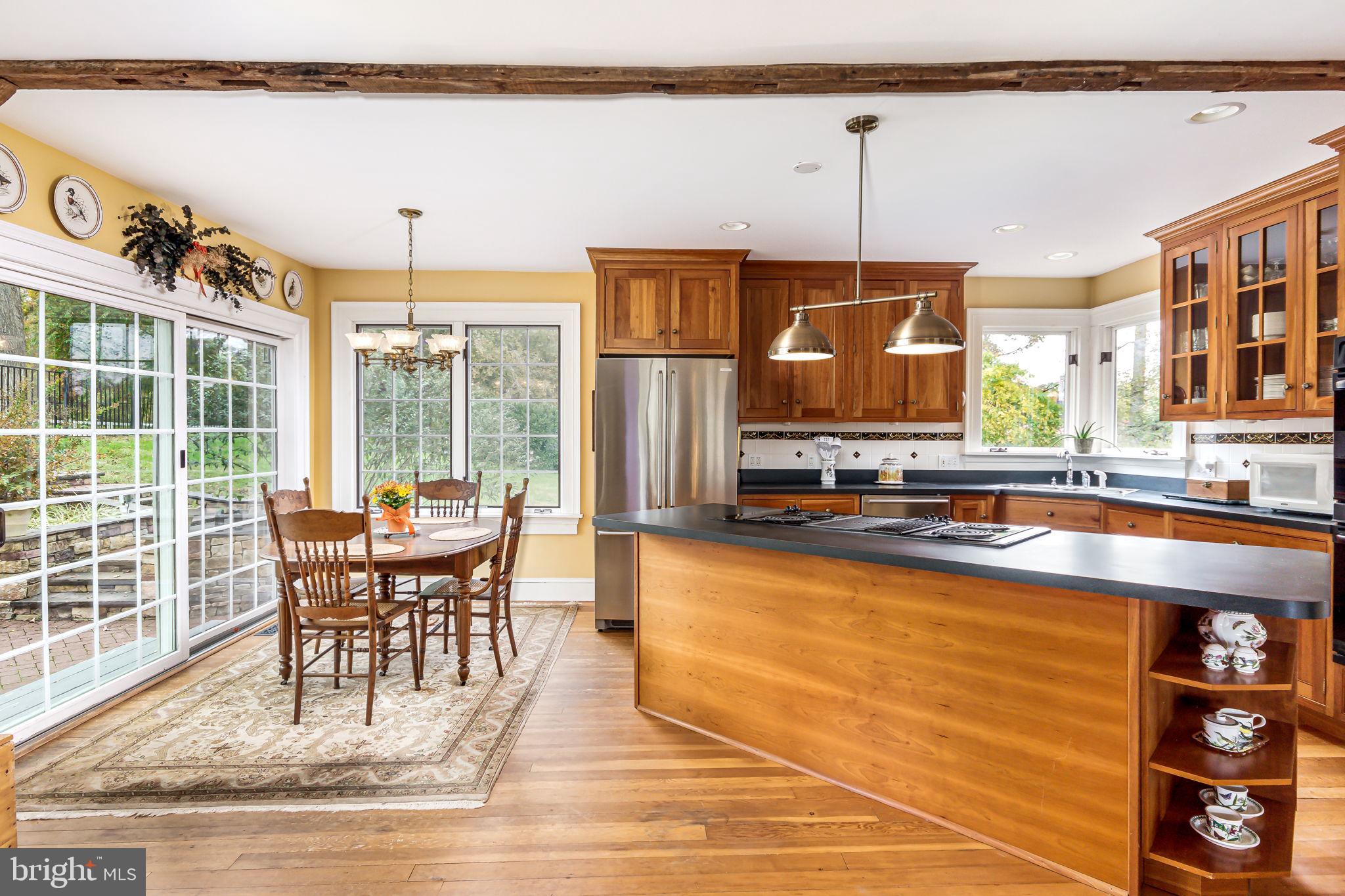 5338 Sudley Road West River, MD 20778 - Photo 15 of 57 Large open kitchen with hardwood floors