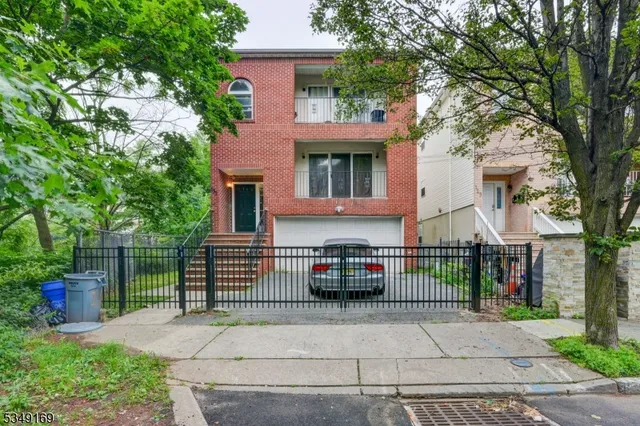 front view of house with a bench