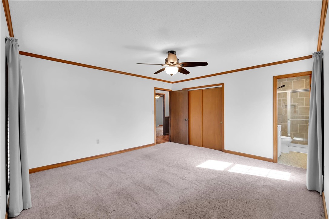 2114 Karen Lane Anderson, SC 29626 - Photo 18 of 30 Bright and airy bedroom with neutral carpeting, ideal for relaxation and personal touches.