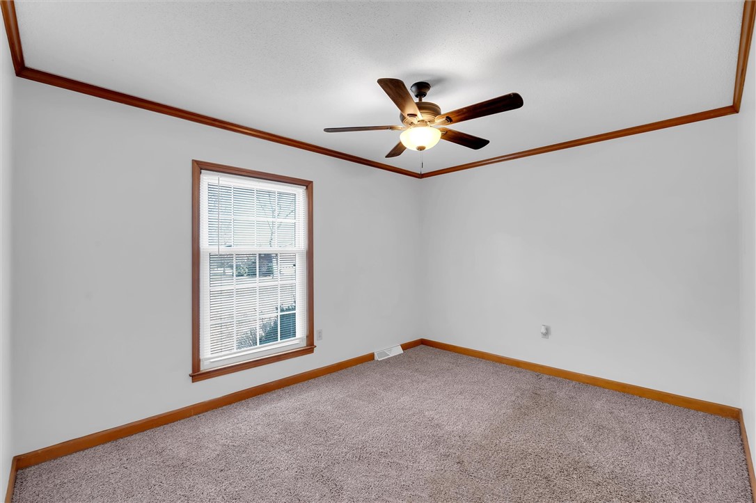 2114 Karen Lane Anderson, SC 29626 - Photo 22 of 30 This cozy bedroom features a bright window and ceiling fan for comfortable living.