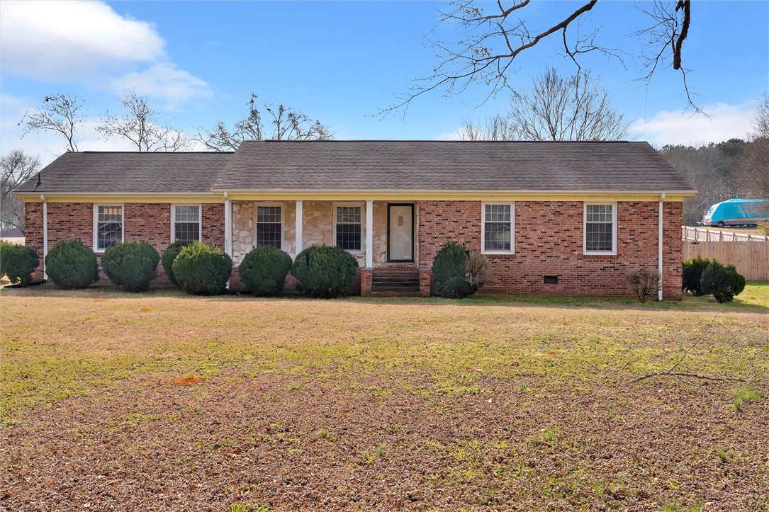 2114 Karen Lane Anderson, SC 29626 - Photo 28 of 30 This charming home features classic brick and stone accents, offering timeless appeal.