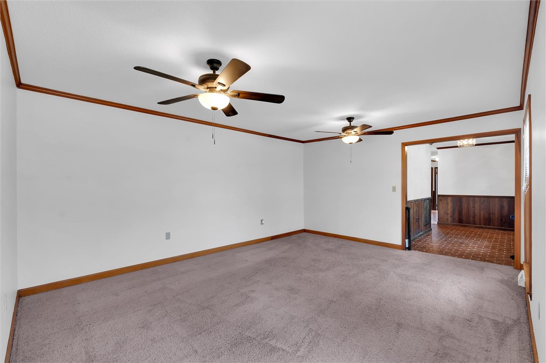 2114 Karen Lane Anderson, SC 29626 - Photo 5 of 30 This inviting space features comfortable carpeting and convenient ceiling fans.