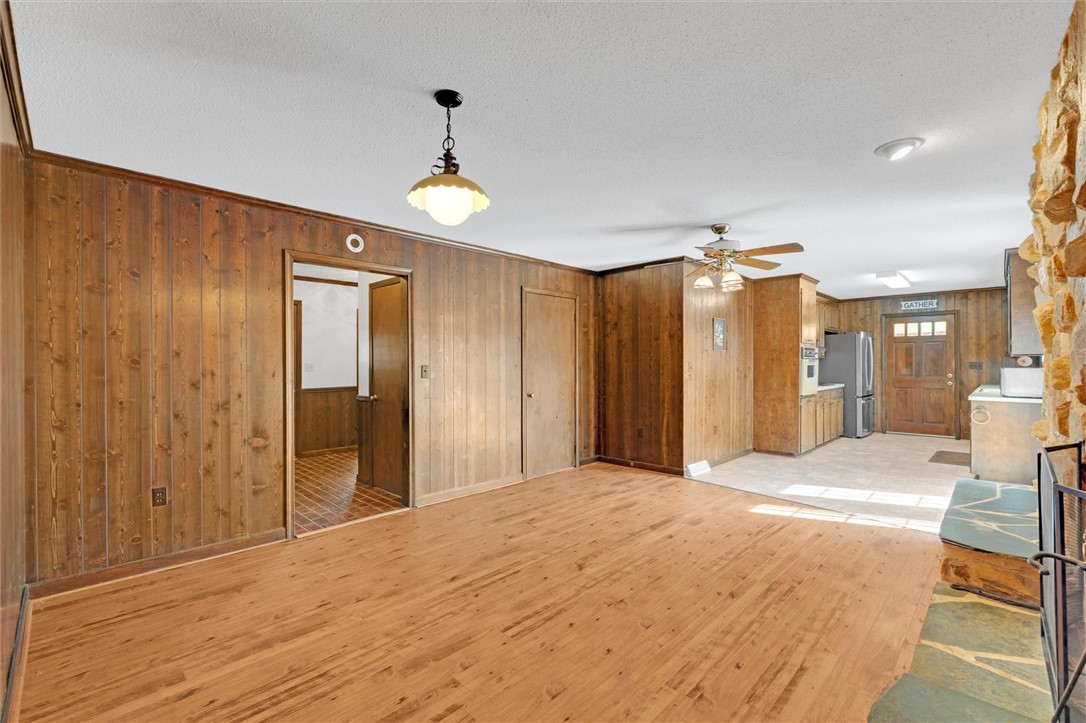 2114 Karen Lane Anderson, SC 29626 - Photo 8 of 30 This inviting space offers an open layout, hardwood flooring, and a captivating stone fireplace feature.