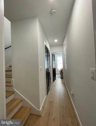 a view of gallery with stairs