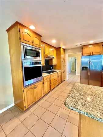 a view of a swimming pool with an outdoor space