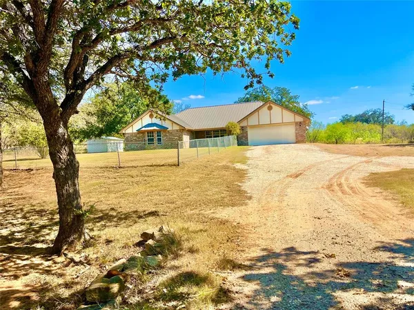 a view of an ocean with a mountain