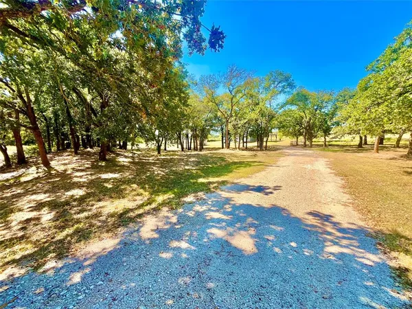 a view of outdoor space with deck and yard