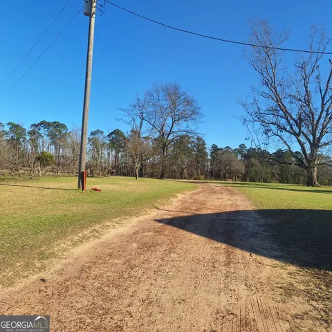 a view of outdoor space and yard