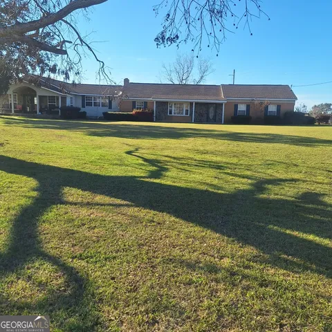 a view of a swimming pool with an ocean view