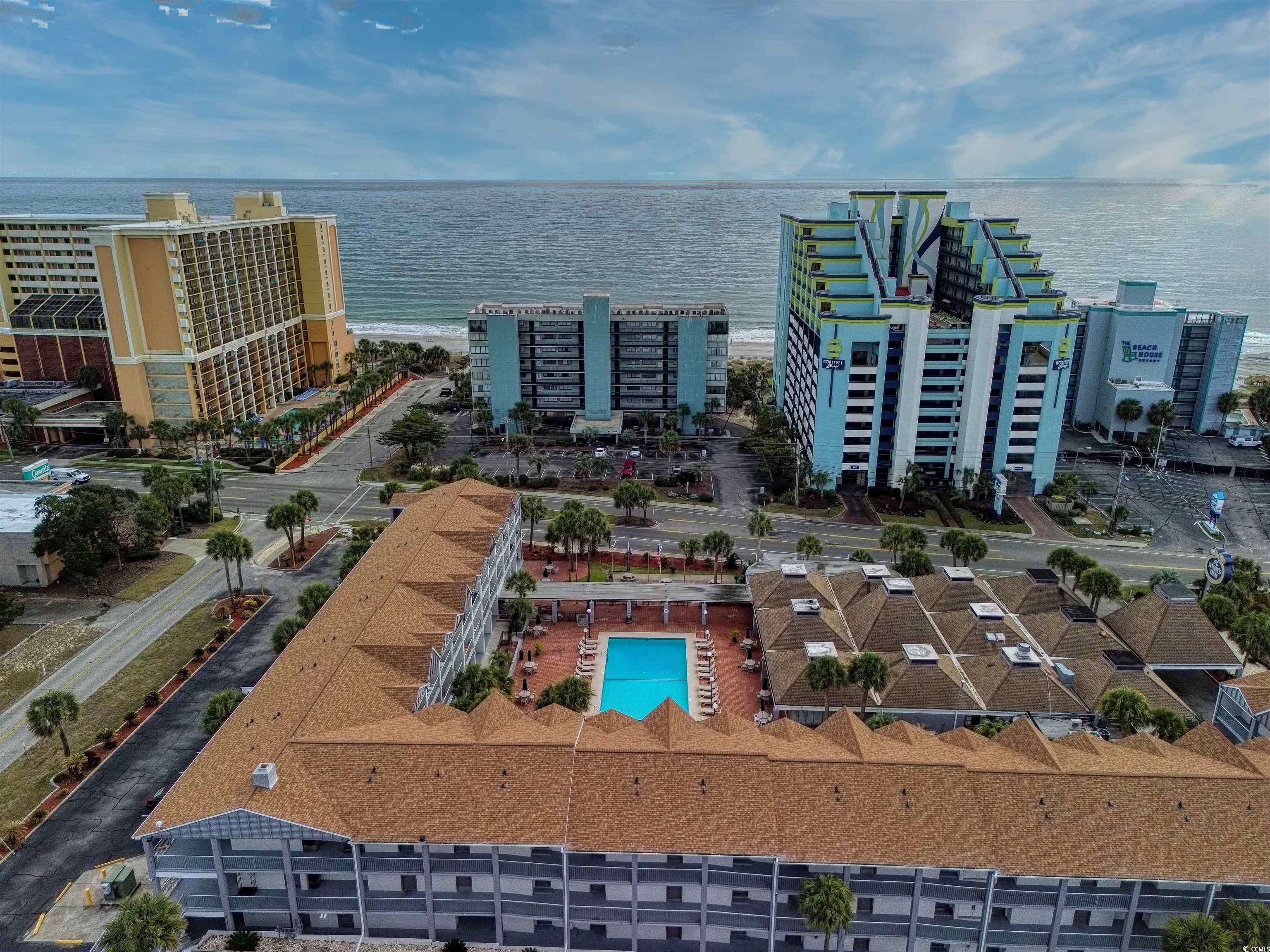 6803 North Ocean Boulevard, Unit 314 Myrtle Beach, SC 29572 - Photo 17 of 19 View of urban area featuring a nearby body of water and a pool area