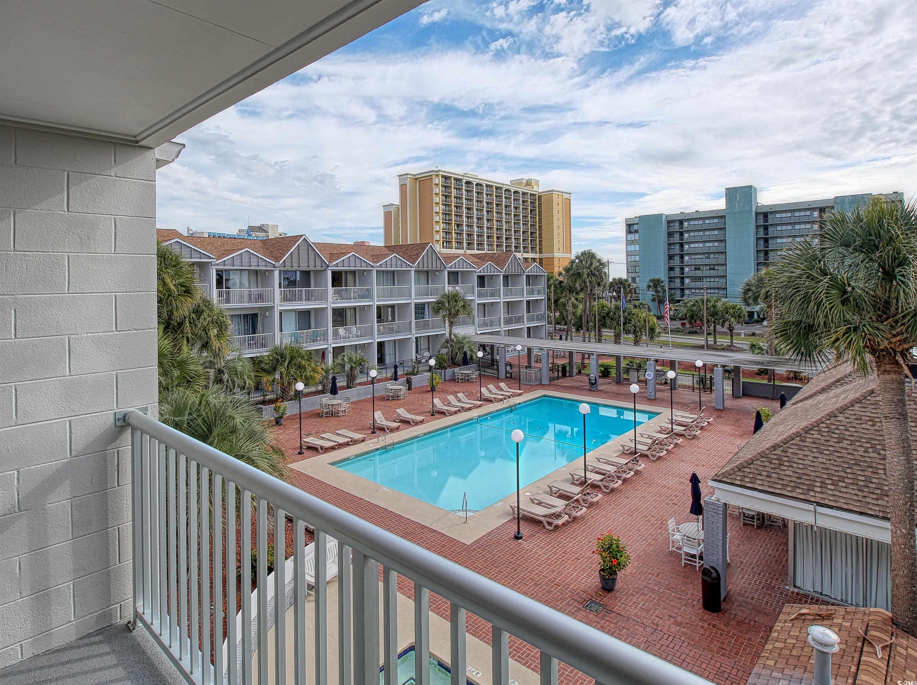6803 North Ocean Boulevard, Unit 314 Myrtle Beach, SC 29572 - Photo 7 of 19 Community pool with a balcony