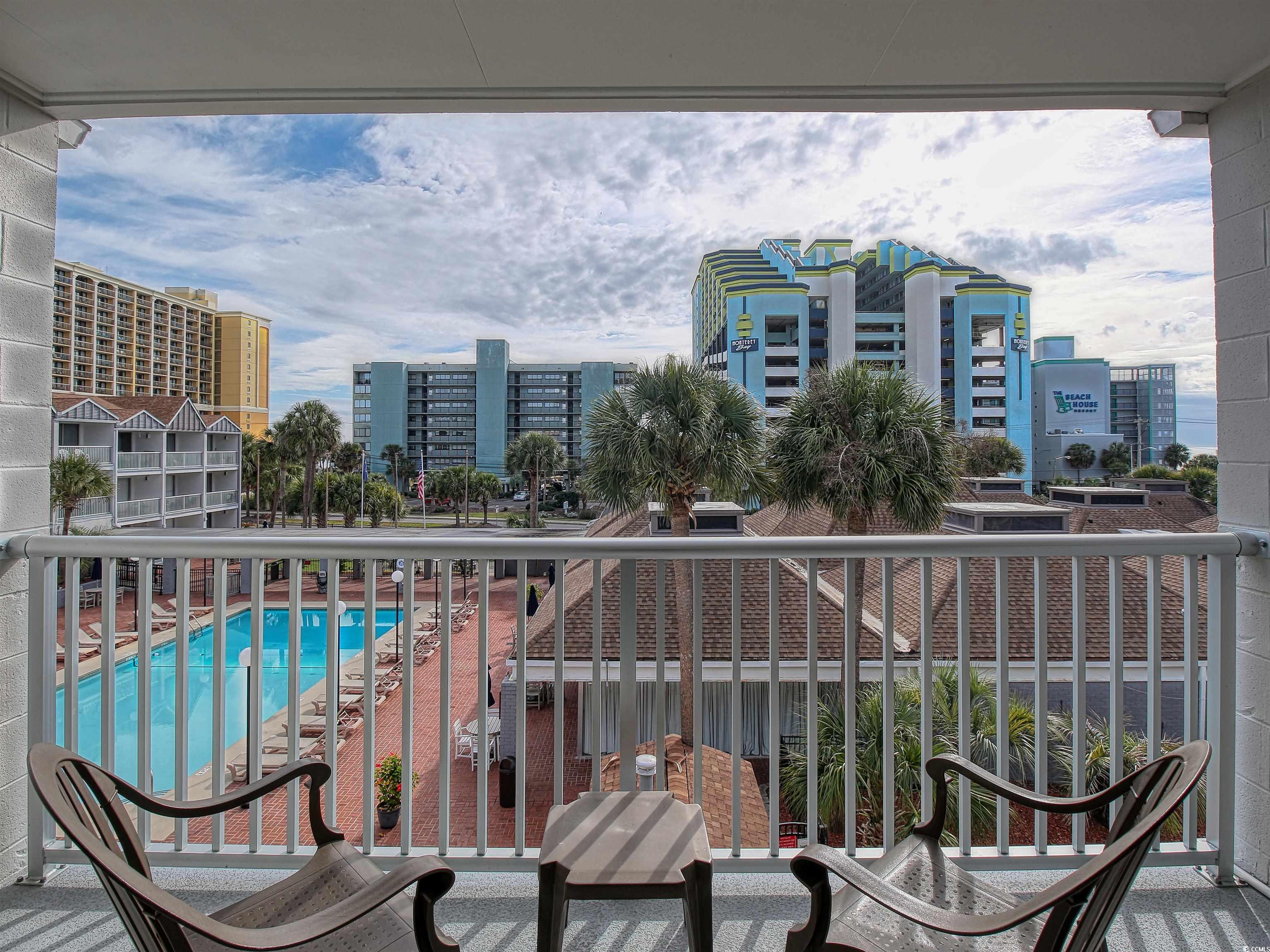 6803 North Ocean Boulevard, Unit 314 Myrtle Beach, SC 29572 - Photo 8 of 19 Balcony featuring view of pool area