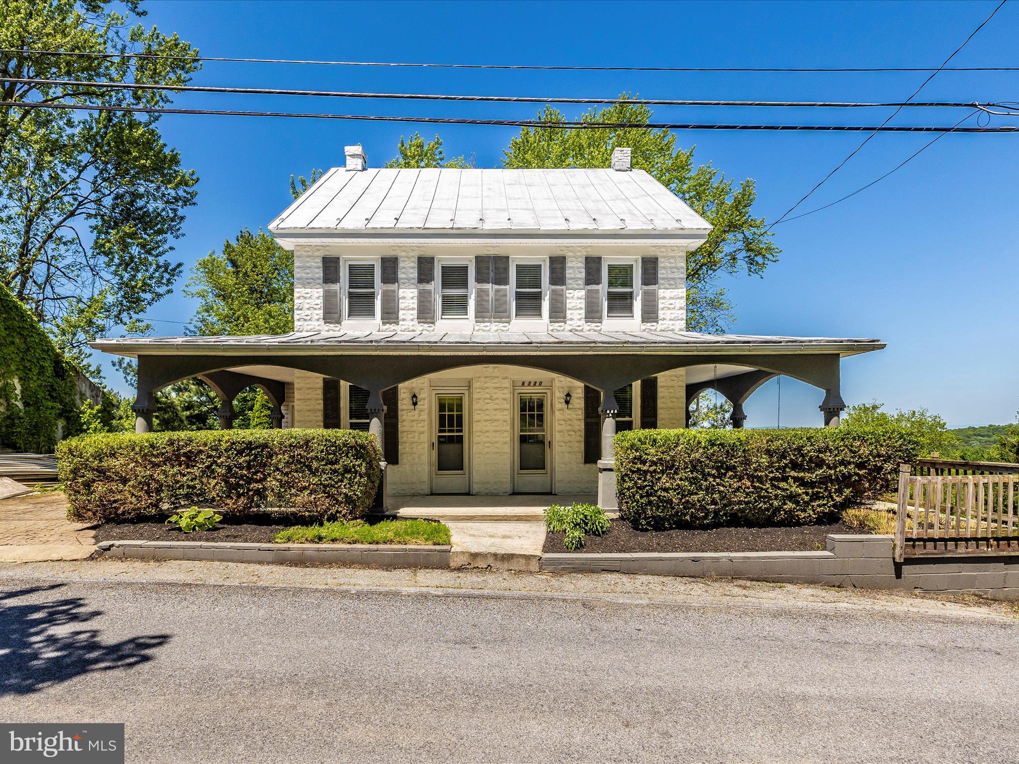 6330 Clevelandtown Road Boonsboro, MD 21713 - Photo 45 of 56 a front view of a house with a garden