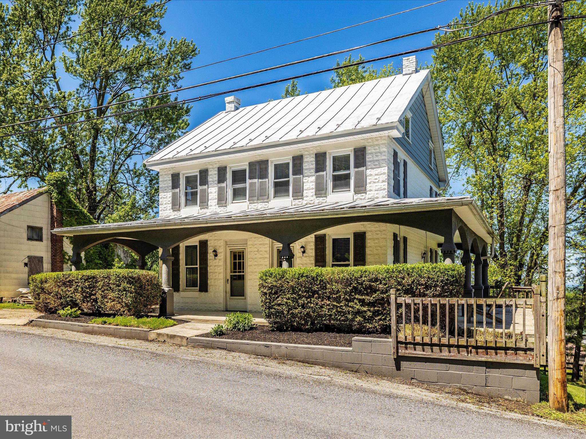 6330 Clevelandtown Road Boonsboro, MD 21713 - Photo 46 of 56 a front view of a house with a garden