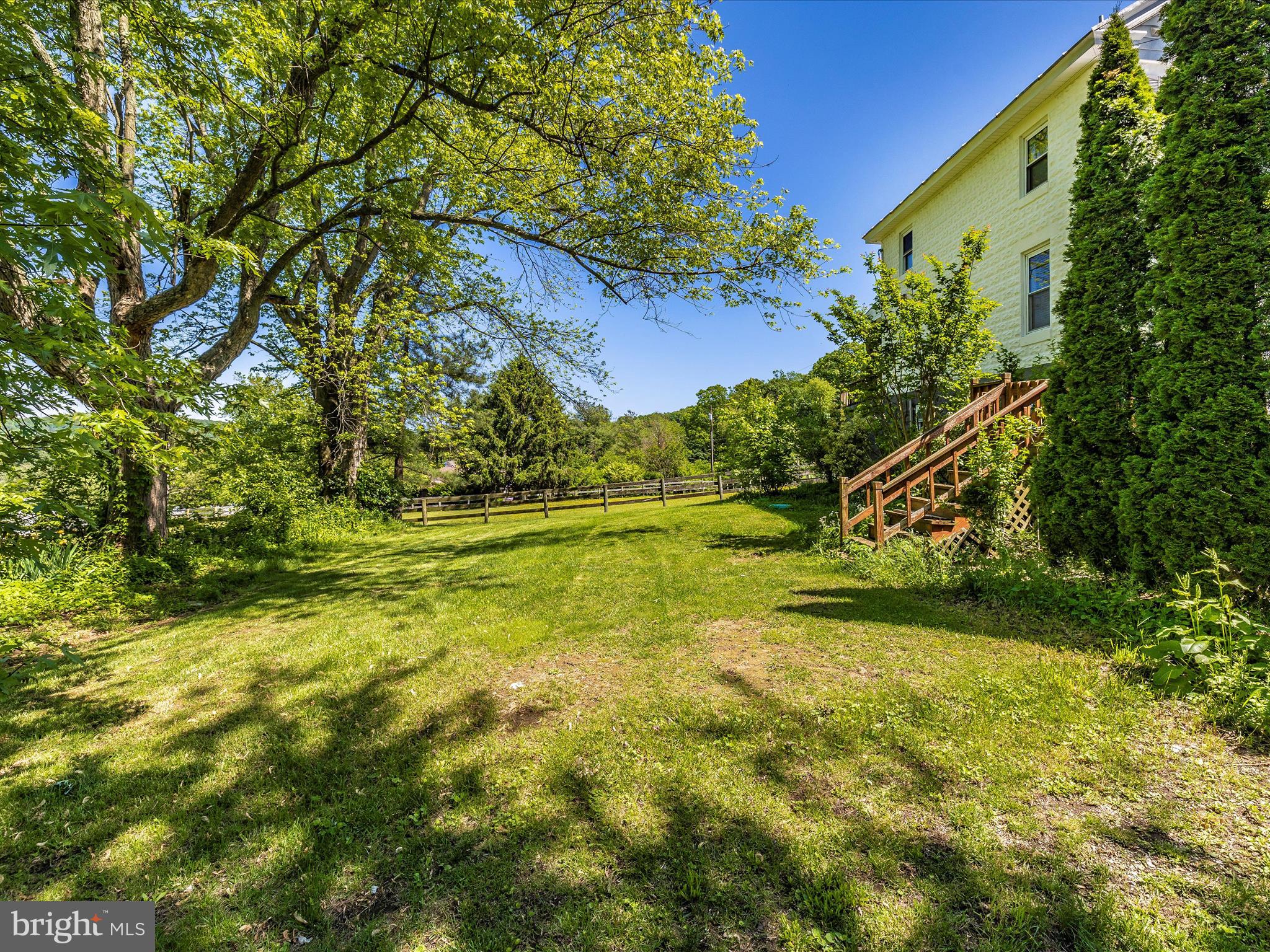 6330 Clevelandtown Road Boonsboro, MD 21713 - Photo 52 of 56 a view of a big yard with plants and large trees