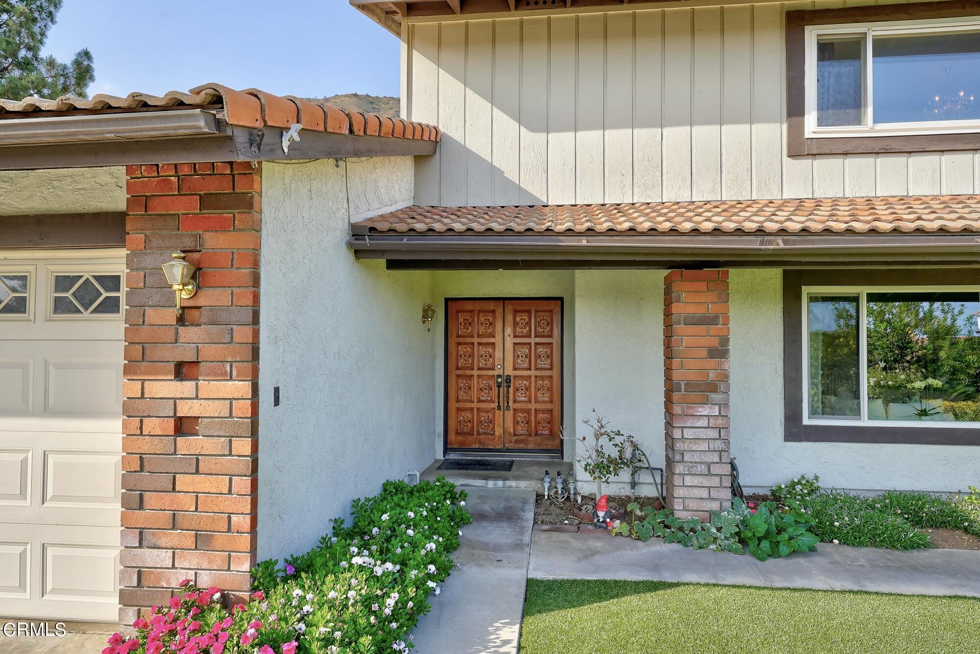 3405 Brookridge Road Duarte, CA 91010 - Photo 4 of 40 a front view of a house with garden