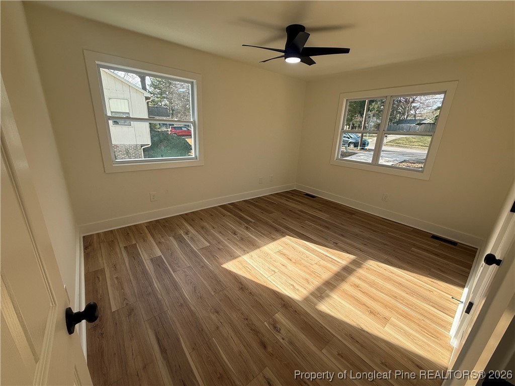5508 Sweetbriar Drive Raleigh, NC 27609 - Photo 13 of 29 a view of an empty room and a window
