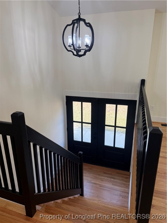 5508 Sweetbriar Drive Raleigh, NC 27609 - Photo 18 of 29 a view of entryway and hall with wooden floor