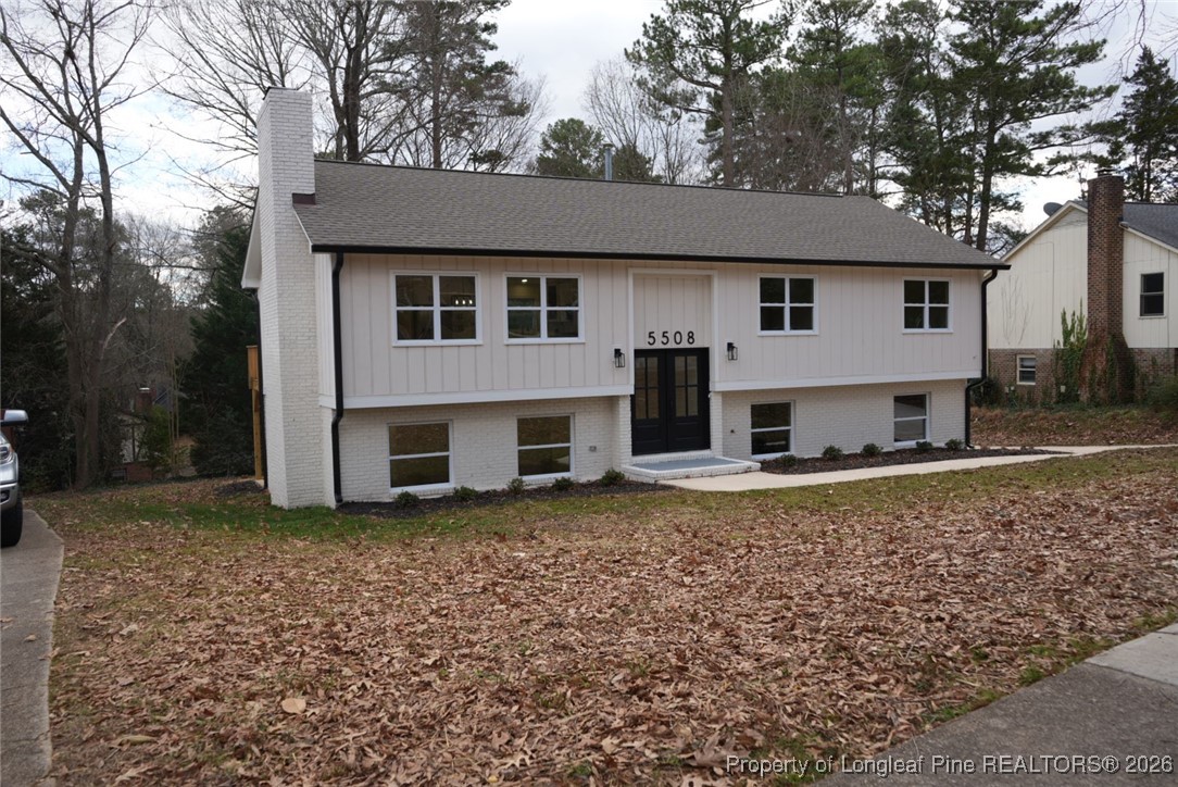 5508 Sweetbriar Drive Raleigh, NC 27609 - Photo 2 of 29 a view of a house with a yard