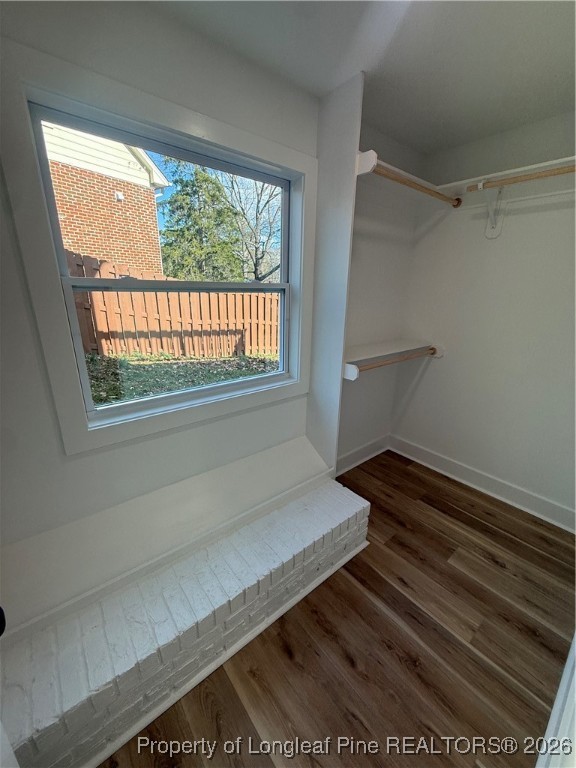 5508 Sweetbriar Drive Raleigh, NC 27609 - Photo 23 of 29 a view of a room with wooden floor and windows