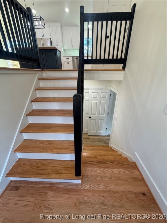 5508 Sweetbriar Drive Raleigh, NC 27609 - Photo 6 of 29 a view of entryway and hall with wooden floor
