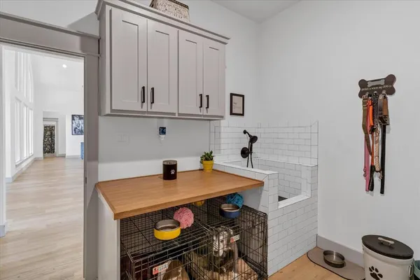a view of a kitchen with appliances and cabinets
