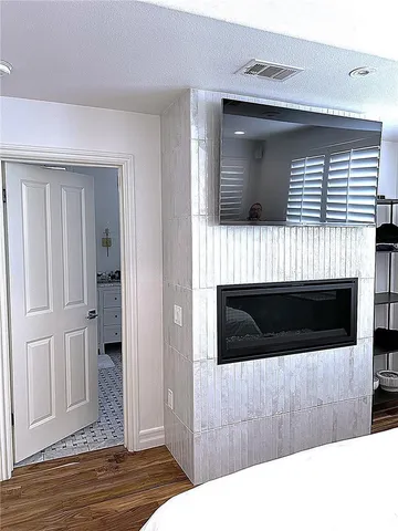 a living room with a fireplace