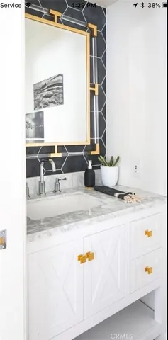 a close view of sink and mirror