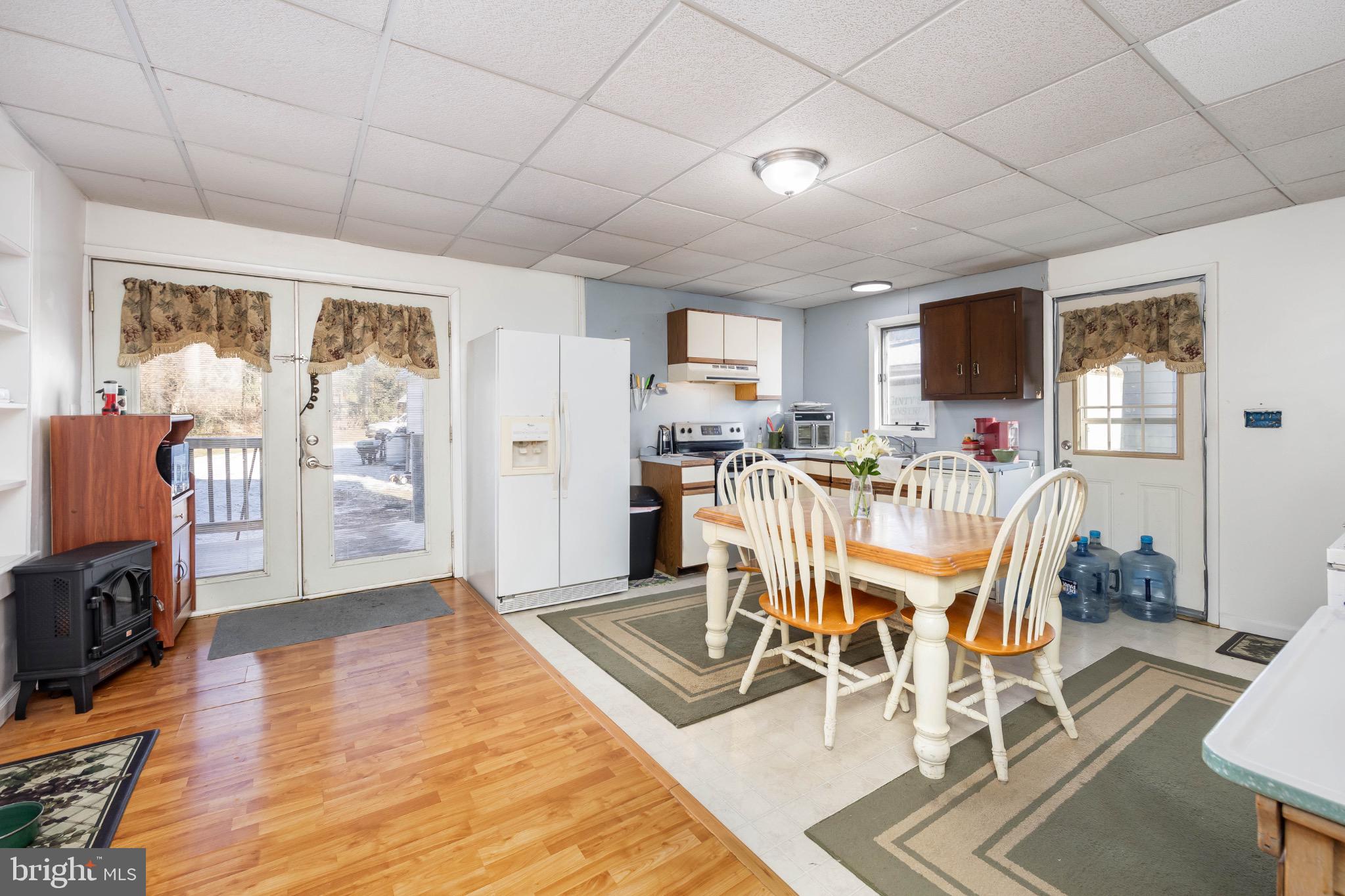 505 Main Street Mardela Springs, MD 21837 - Photo 18 of 60 a view of a dining room with furniture window and wooden floor