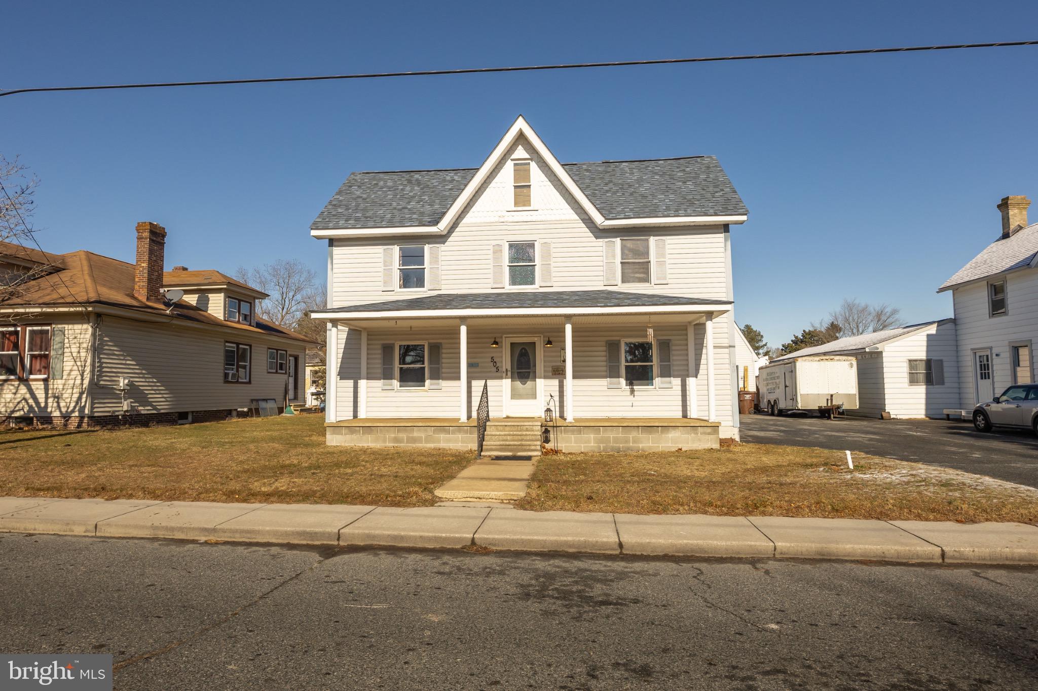 505 Main Street Mardela Springs, MD 21837 - Photo 2 of 60 a front view of a house with a yard