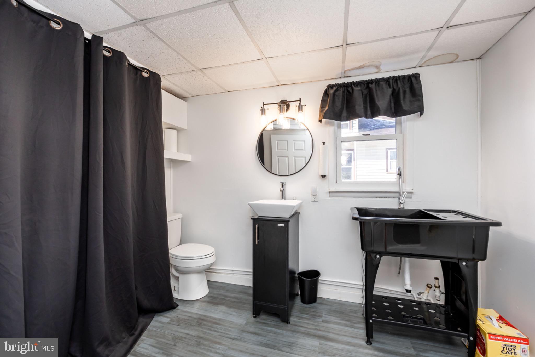 505 Main Street Mardela Springs, MD 21837 - Photo 23 of 60 a view of bathroom with a sink and a mirror
