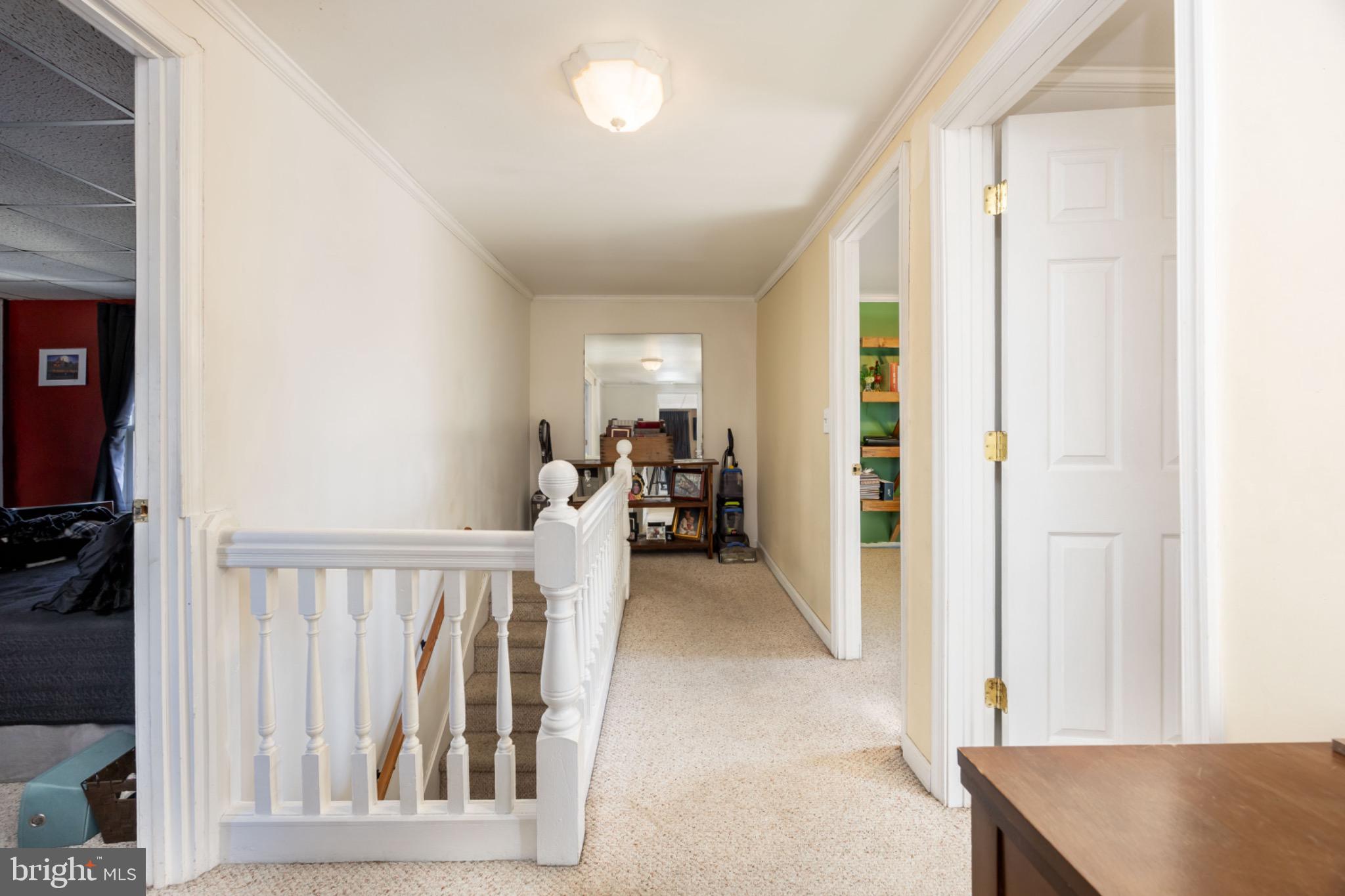 505 Main Street Mardela Springs, MD 21837 - Photo 26 of 60 a view of a hallway with furniture and staircase