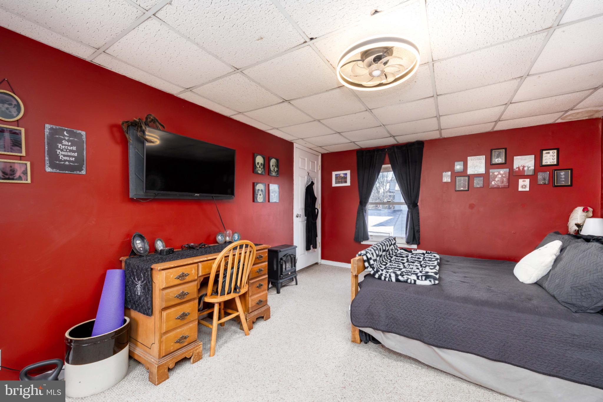 505 Main Street Mardela Springs, MD 21837 - Photo 28 of 60 a living room with furniture and a flat screen tv