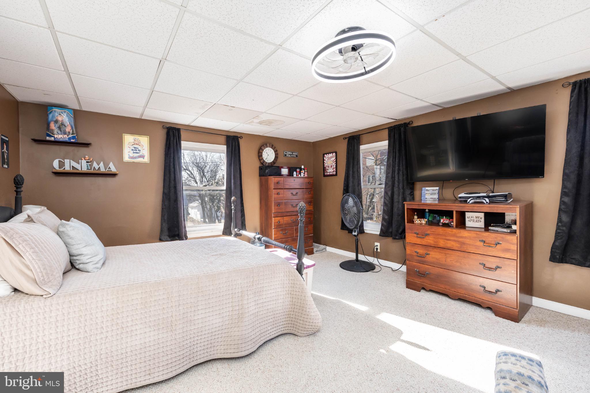 505 Main Street Mardela Springs, MD 21837 - Photo 30 of 60 a bedroom with a bed a flat tv screen and a large closet
