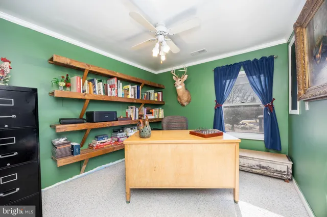 a view of a house with a yard and garage