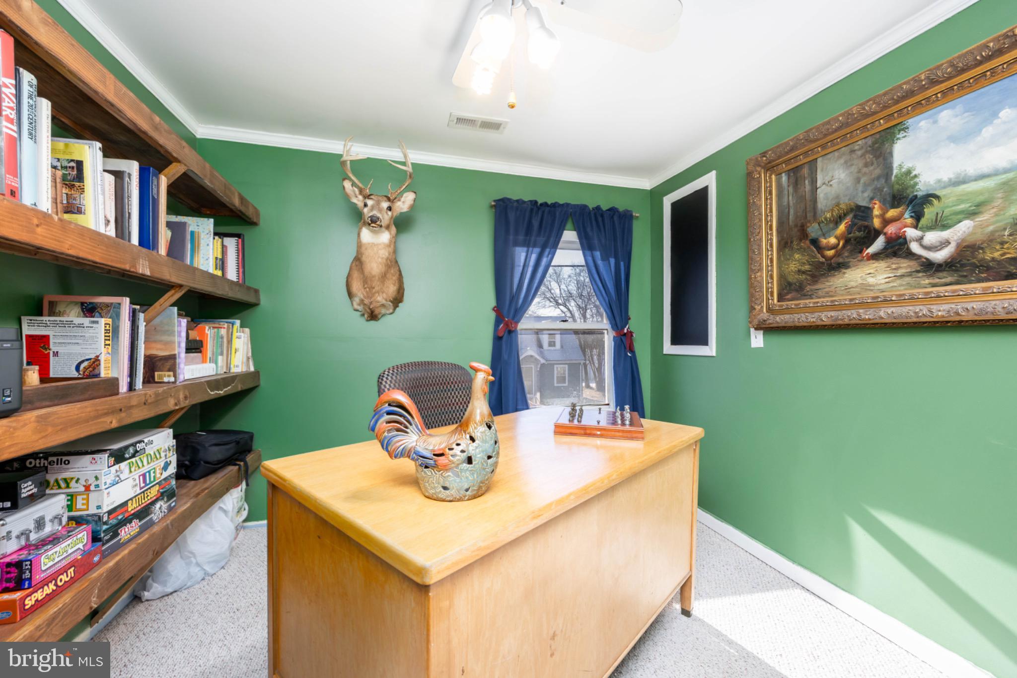 505 Main Street Mardela Springs, MD 21837 - Photo 39 of 60 a dining room with furniture and book shelf