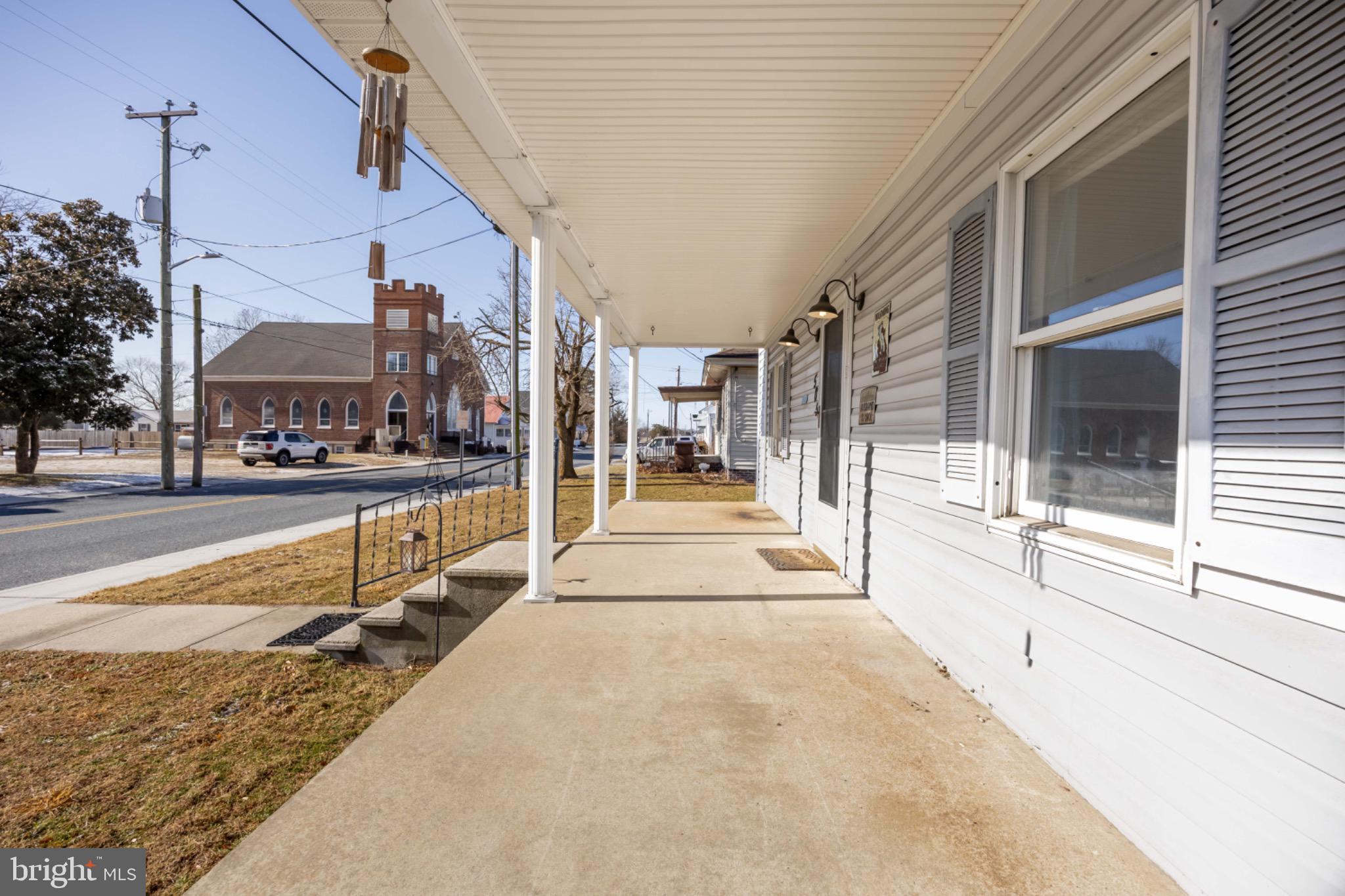 505 Main Street Mardela Springs, MD 21837 - Photo 4 of 60 a view of a balcony with furniture