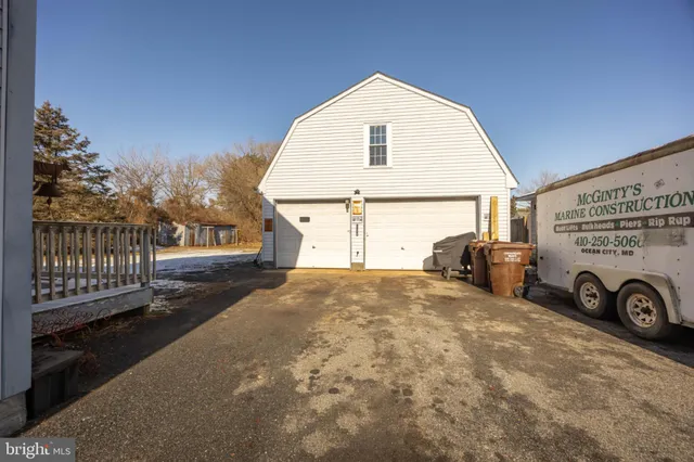 a view of a balcony with wooden fence