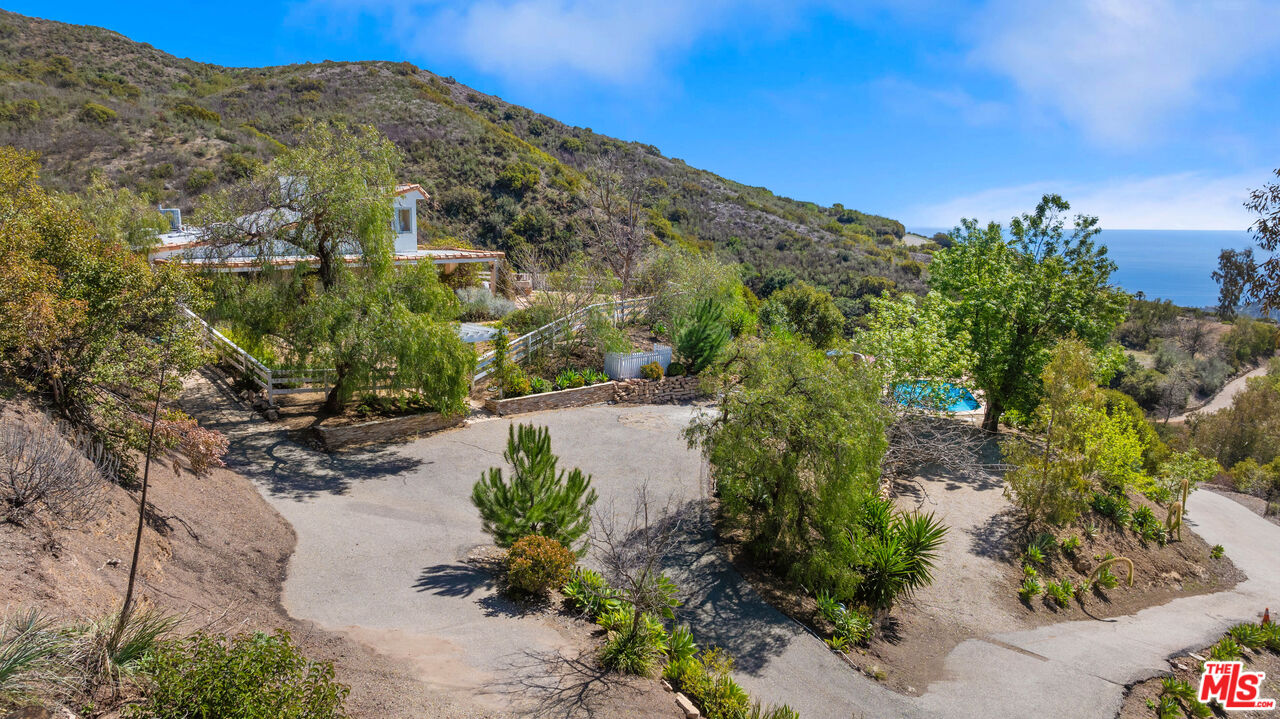 2302 Latigo Canyon Road Malibu, CA 90265 - Photo 20 of 30 a view of a houses with a yard