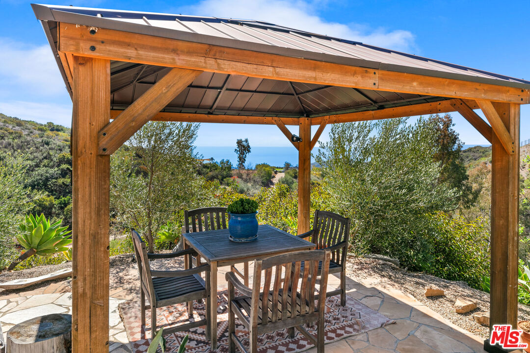 2302 Latigo Canyon Road Malibu, CA 90265 - Photo 26 of 30 a view of chair and table in the patio
