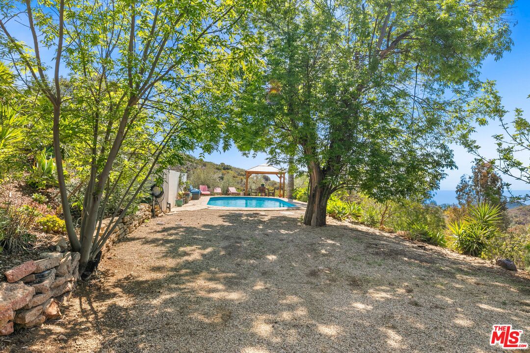 2302 Latigo Canyon Road Malibu, CA 90265 - Photo 27 of 30 a view of backyard with green space