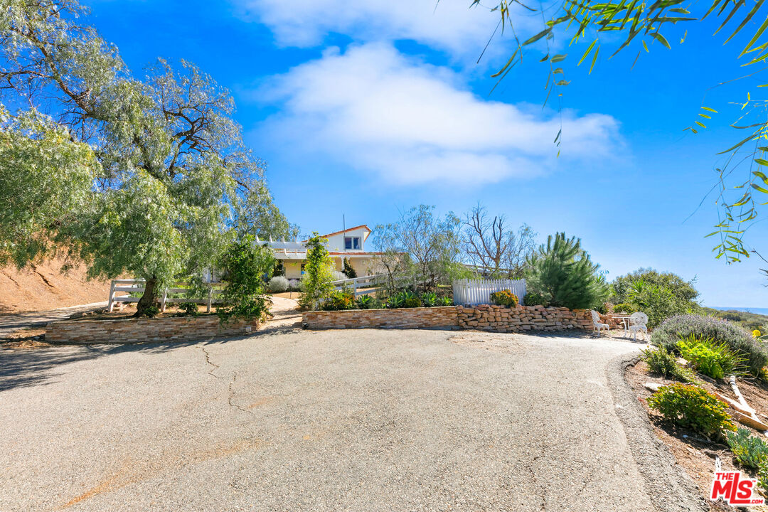 2302 Latigo Canyon Road Malibu, CA 90265 - Photo 29 of 30 a view of a street with a building in the background