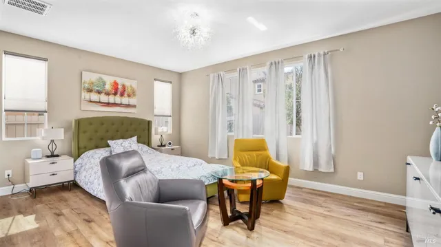 a living room with furniture and a table