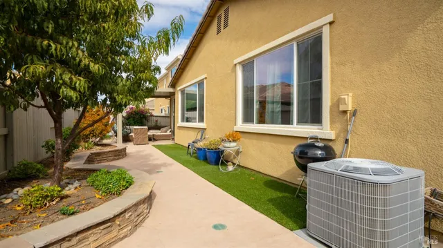 a house view with a garden space