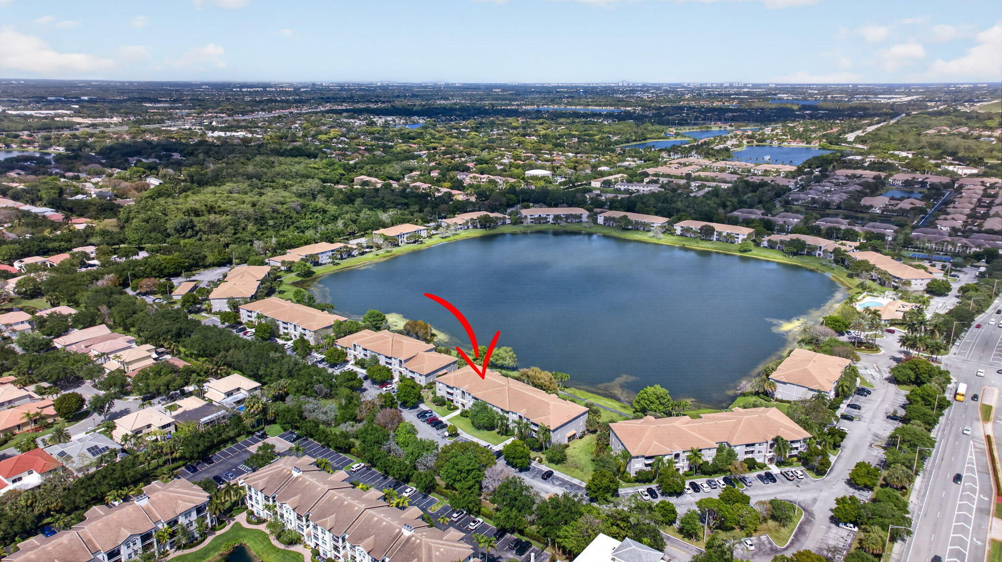 5011 Wiles Road, Unit 104 Coconut Creek, FL 33073 - Photo 36 of 43 an aerial view of residential houses with outdoor space