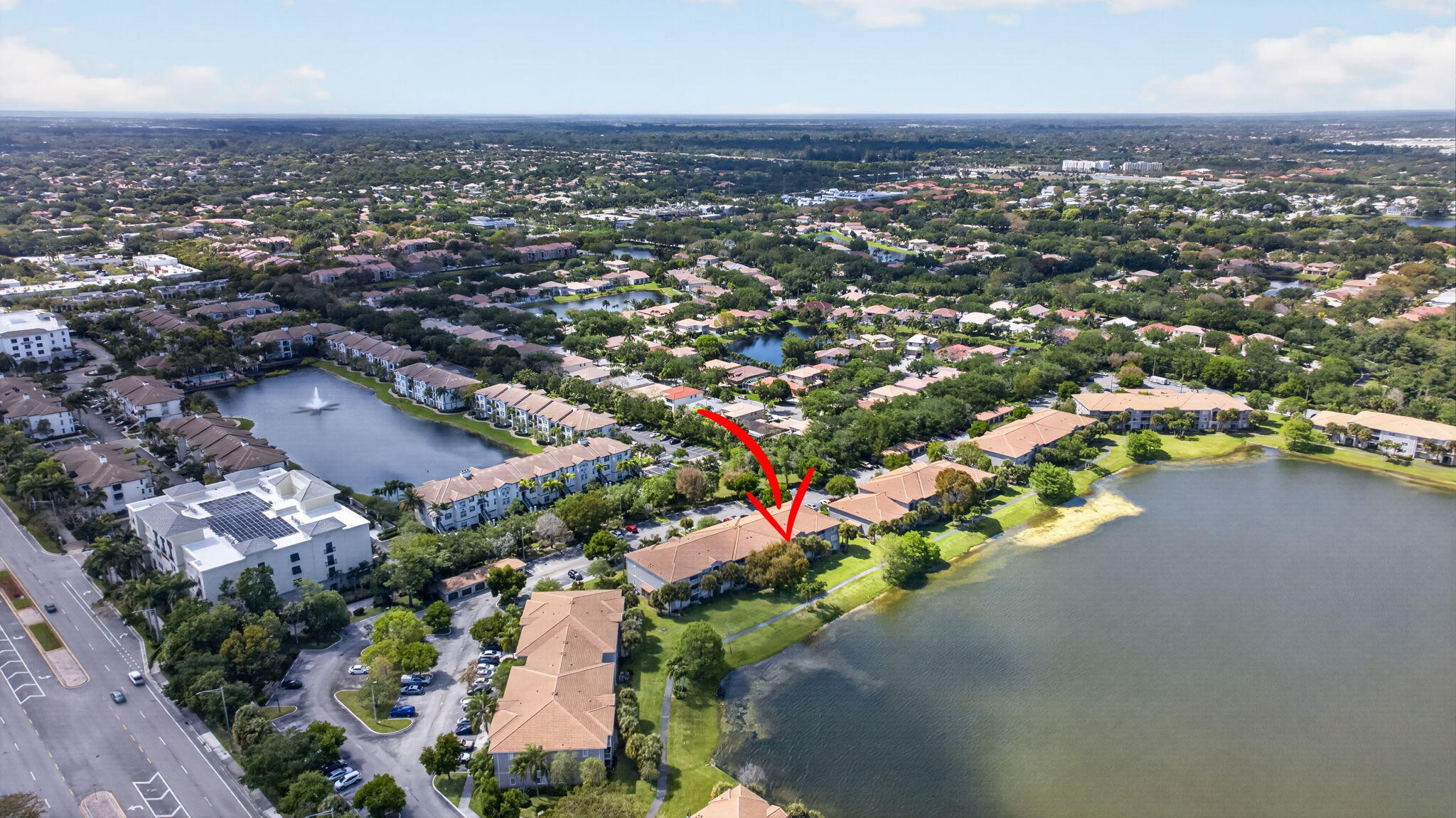 5011 Wiles Road, Unit 104 Coconut Creek, FL 33073 - Photo 37 of 43 an aerial view of a city with lots of residential buildings