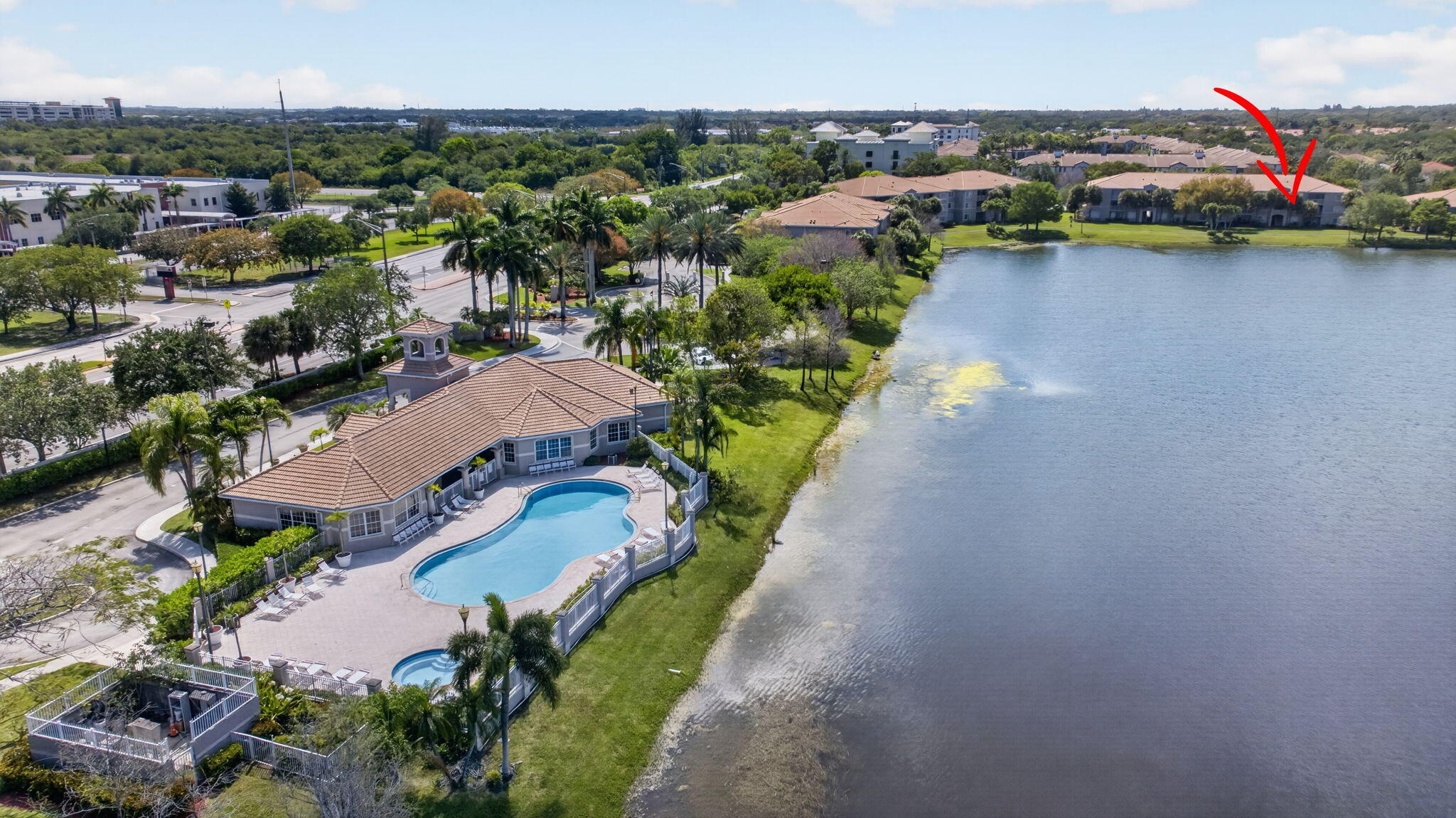 5011 Wiles Road, Unit 104 Coconut Creek, FL 33073 - Photo 41 of 43 an aerial view of residential houses with outdoor space