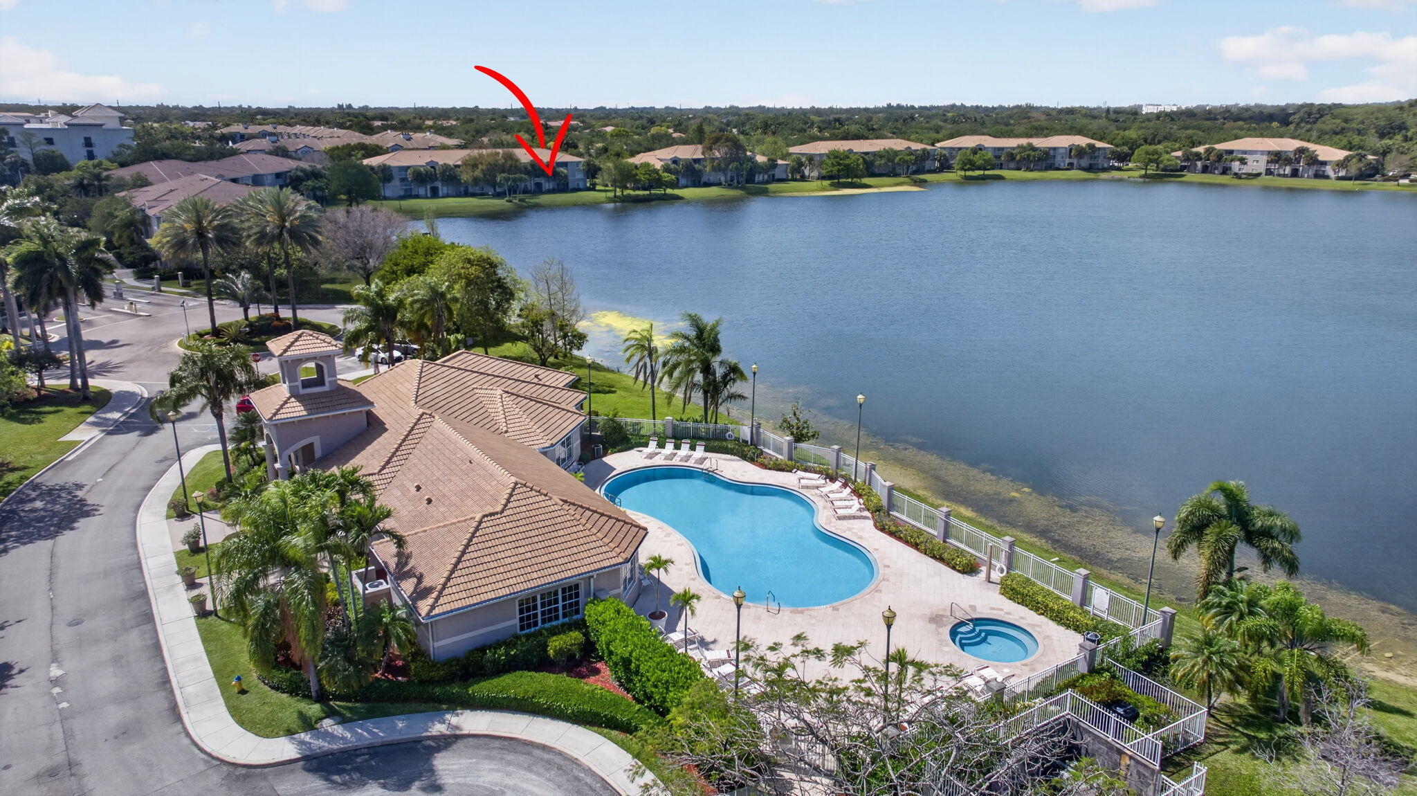 5011 Wiles Road, Unit 104 Coconut Creek, FL 33073 - Photo 43 of 43 an aerial view of a house with outdoor space and lake view