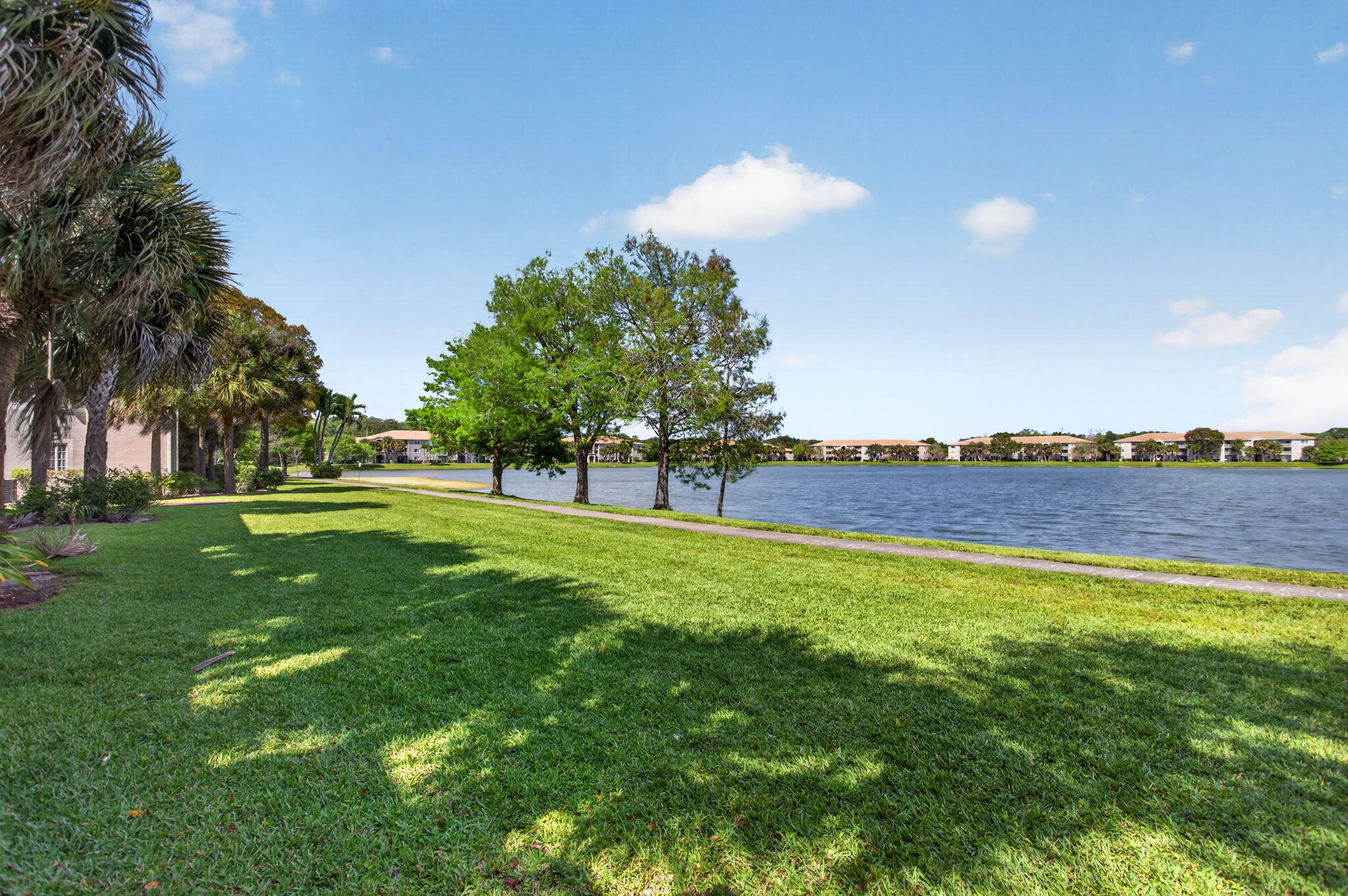 5011 Wiles Road, Unit 104 Coconut Creek, FL 33073 - Photo 5 of 43 a view of green field