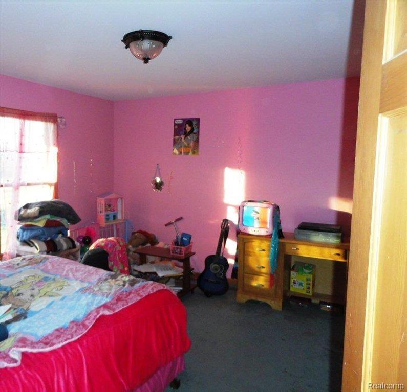 5676 Hessen Road Casco, MI 48064 - Photo 16 of 19 BEDROOM PINK.JPG